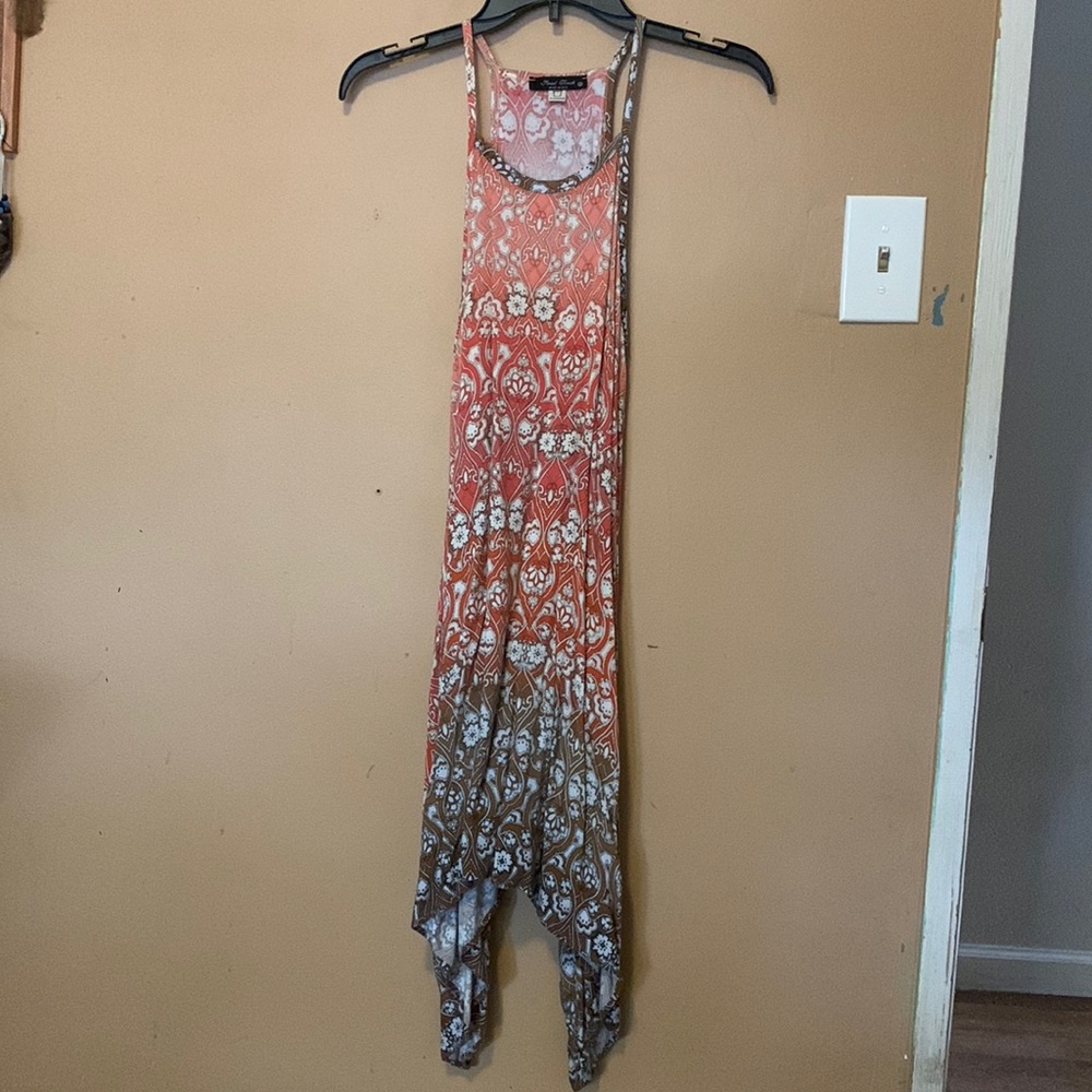 Coral ombré knee length spaghetti strap dress. Longer on the sides.